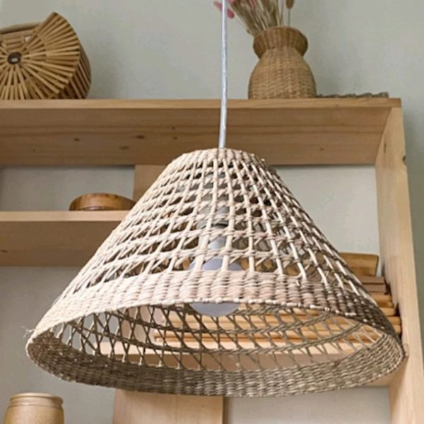 Invite a slice of nature into your home with this Seagrass Pendant Lamp-leaf Shade. It spreads a warm, cozy light in the room.