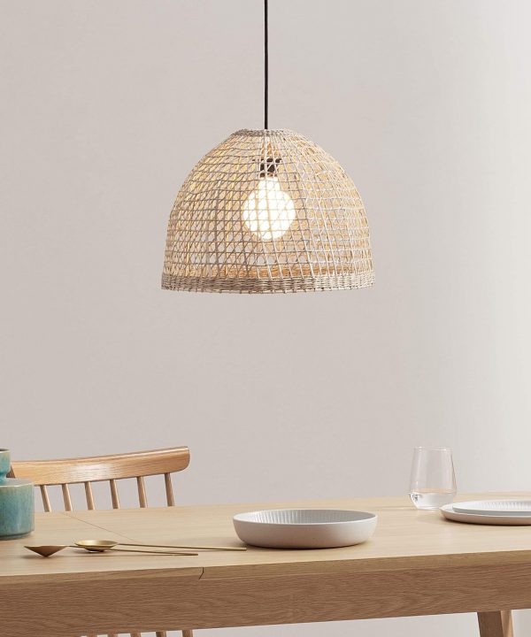 Invite a slice of nature into your home with this Handwoven Seagrass Pendant Lamp Shade. It spreads a warm, cozy light in the room.