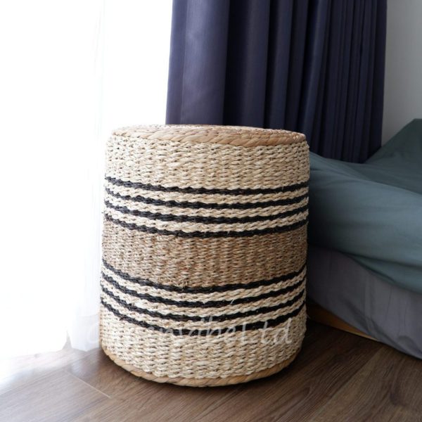 Handwoven with seagrass, water hyacinth, and palm leaf, this Natural Round Pouf creates both rustic and fancy impressions at the same time.