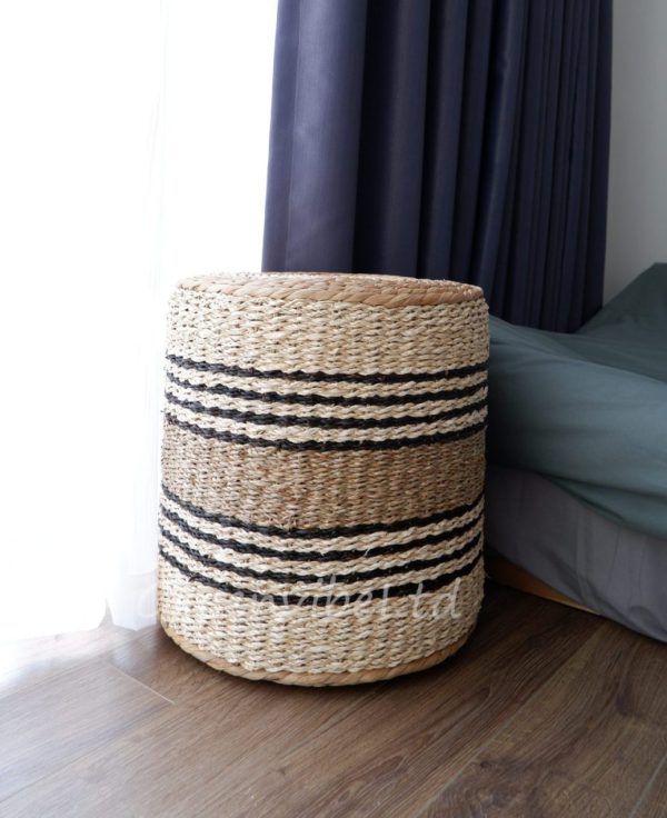 Handwoven with seagrass, water hyacinth, and palm leaf, this Natural Round Pouf creates both rustic and fancy impressions at the same time.