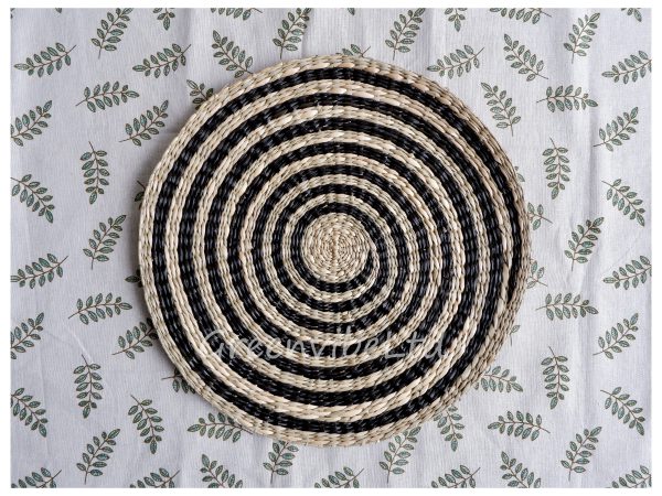 Minimalist black-striped seagrass placemat will decorate your house in a simple, unique but not boring way.