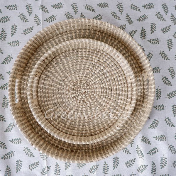 Made of eco-friendly materials, a Set of 2 Rounded Seagrass Palm Leaf Trays contributes to decorating your kitchen to be more attractive.