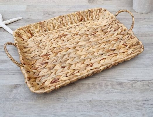 A rectangular wicker tray may also be used to store towels and cosmetics in the bathroom. It is made of natural material with sturdy frame.