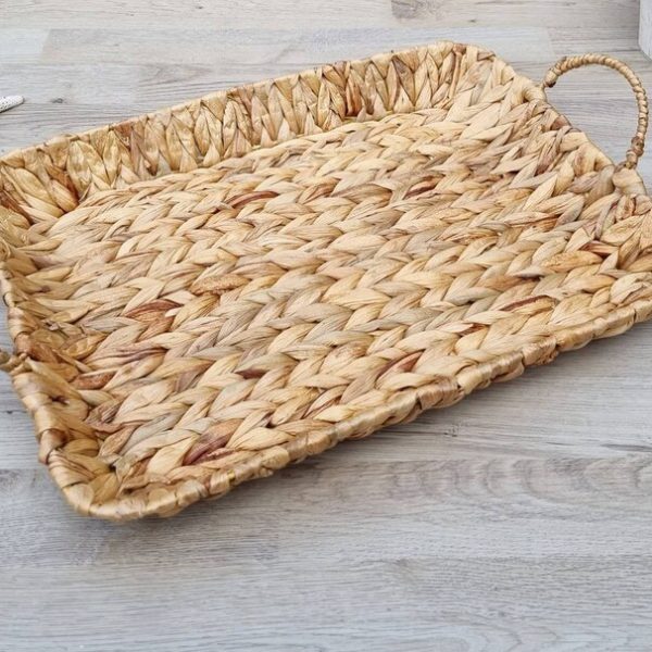 A rectangular wicker tray may also be used to store towels and cosmetics in the bathroom. It is made of natural material with sturdy frame.