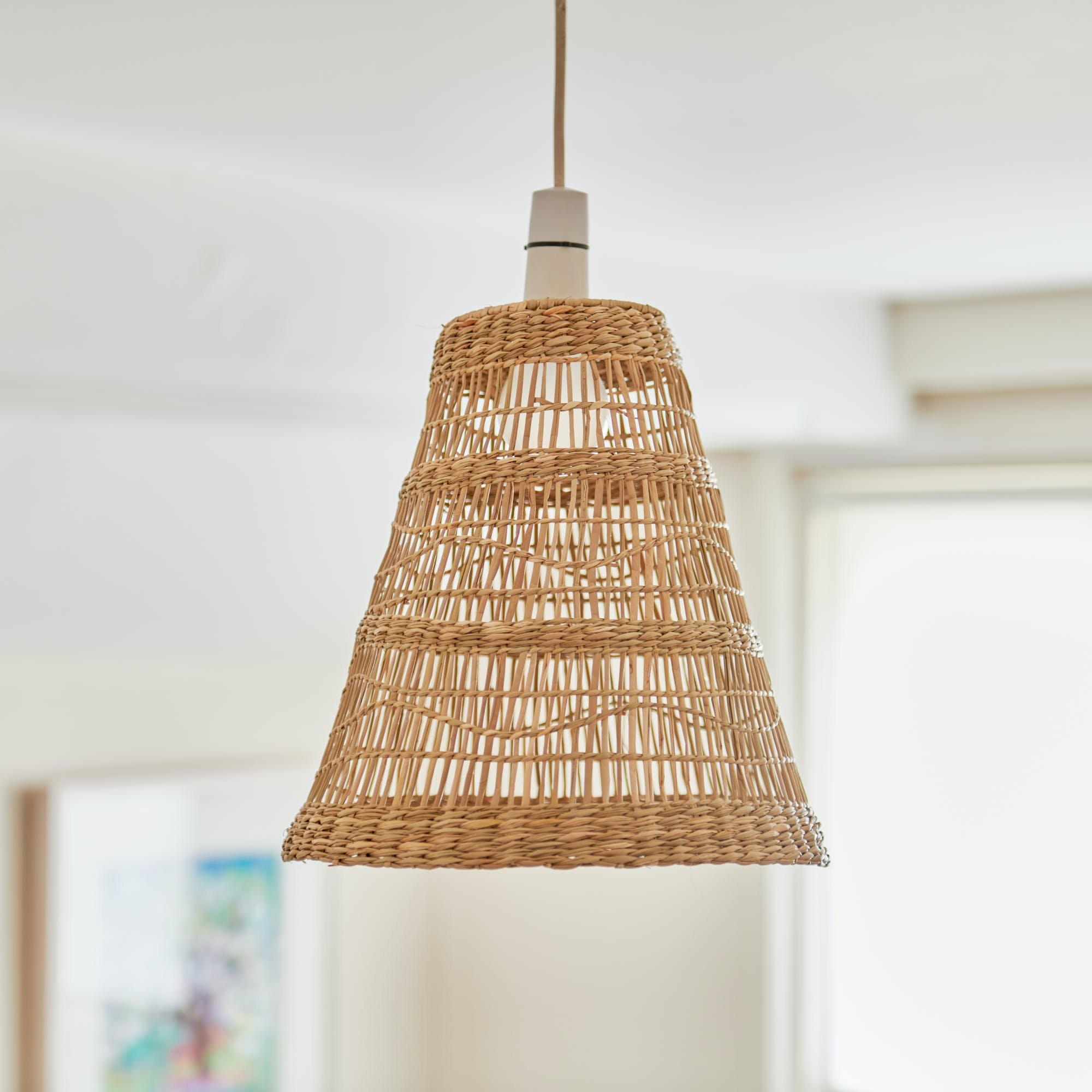 Our seagrass lamp shade is the perfect way to introduce a little nature into your home. Handwoven with natural seagrass fiber.