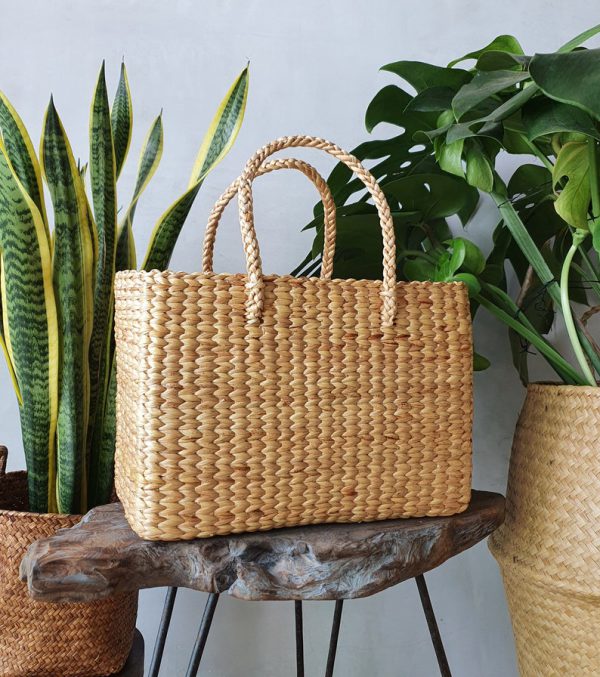 This Woven Water Hyacinth Handbag can store your stuff for travel such as food, wallet, glasses, cell phone, cosmetics, etc.