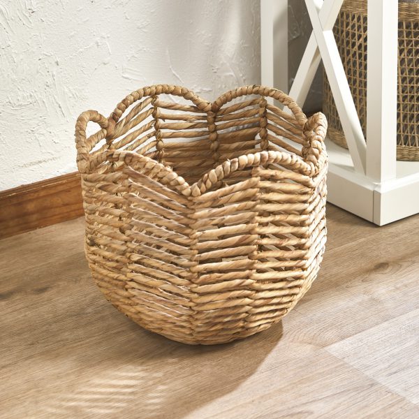 Check out our Open Weave Water Hyacinth Scalloped Basket, handwoven by artisans. Perfect for storing toys, or being a plant base!