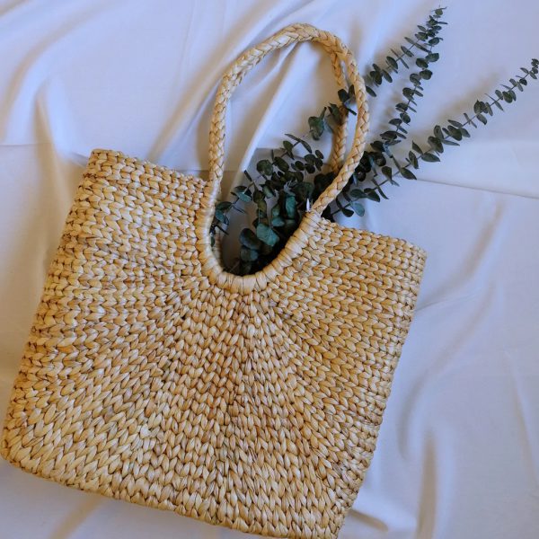 Seagrass Beach Tote mix and match with a floral maxi dress or something as simple as a T-shirt and shorts.