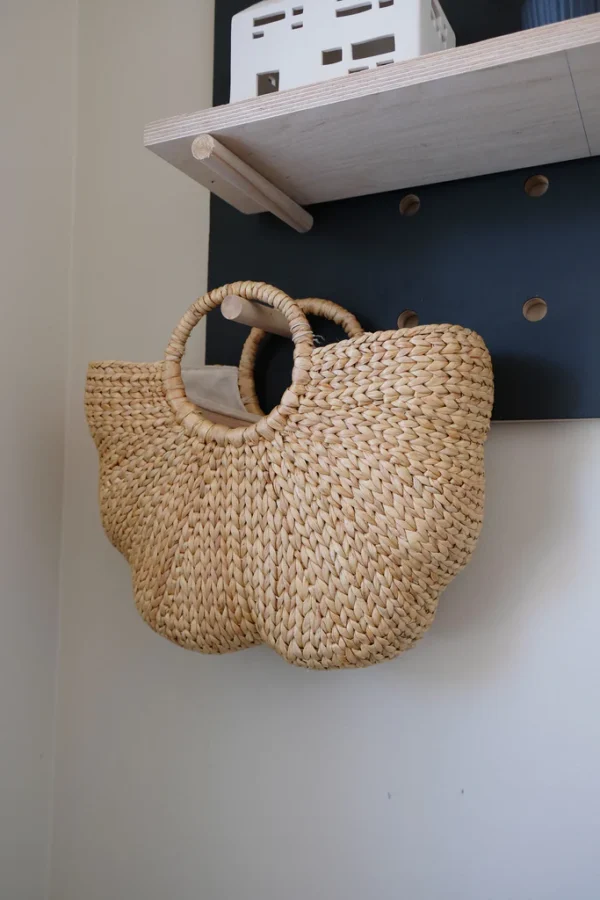 Wear this handwoven Hyacinth Handbag for a simple and elegant look this season as an everyday bag of for events.